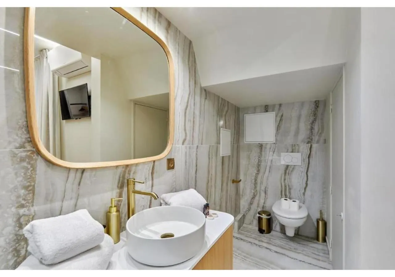 Apartment Le Marais Place Des Vosges By Studio Prestige Paris
